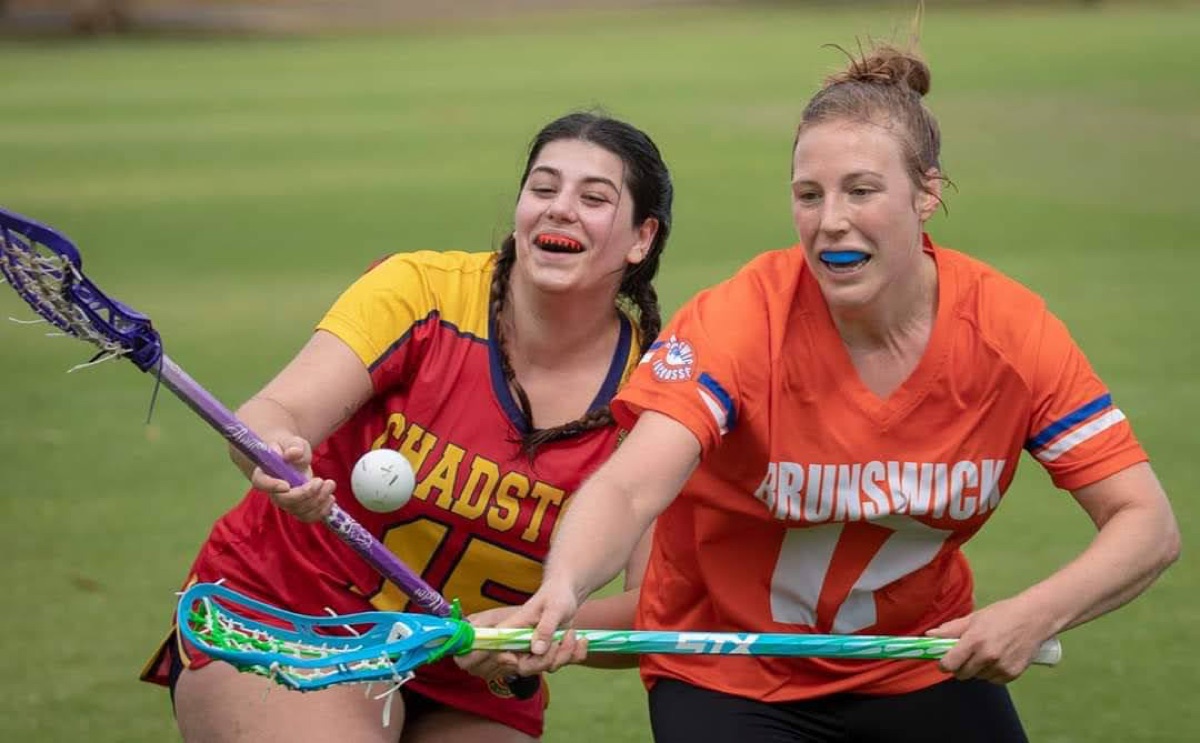 Chadstone Redbacks women’s lacrosse players celebrating