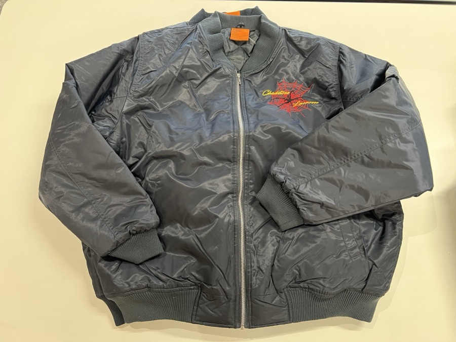 Weather-resistant jacket in club navy with spider embroidery